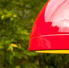 The suspension has a pretty red lacquered finish.