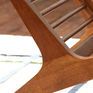 Its solid beech wood structure features dynamic oblique lines that are both classic and modern