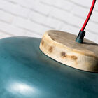 Un disco in legno massello aggiunge un tocco naturale.