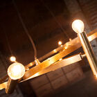 The chandelier is entirely made of gilded brass.