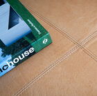 Light natural coloured leather with elegant stitching.