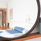 Remarkable for its neat frame and its bevelled edge.