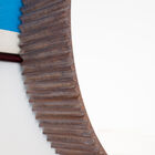 a pretty notched frame reminiscent of the corrugated iron covering some old roofs.