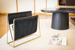 Black leather magazine holder