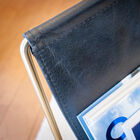 Emphasis on the quality of the leather and the finish of the seams.