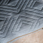 Beautiful golden details of the button and zipper.