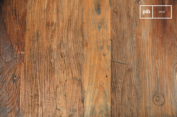 This table has a stained solid elm top mounted on a steel frame