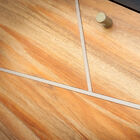 The brass grooves delicately recall the gold handles.