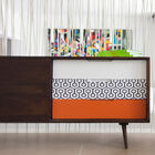 The drawers are coloured and graphic.