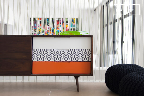 The drawers are coloured and graphic.