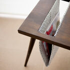 The magazine holder has pretty black and white graphic motifs.