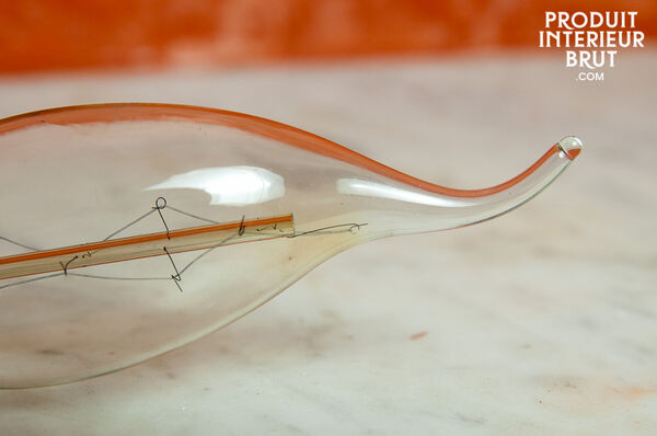 Use long-filament flame bulbs in all your ceiling and wall lights