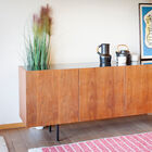 The buffet has 4 storage compartments.