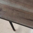 The pretty tray rests on a discreet metal structure.