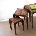 Trio of elegant lounge tables.