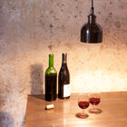 A small pendant light to enlighten a bedhead, a bar or table