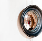 All wooden mirror with a slightly curved glass.