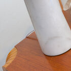 Large white marble foot giving it a remarkable balance.