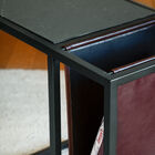 The pretty leather magazine rack has a beautiful burgundy colour.