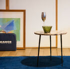 Low table in marble and metal is slender, chic and elegant.