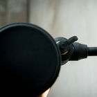 Black colour, neat finish, modest and refined structure.