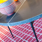 The rough and rough side finish enhances the table top.