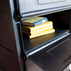 The drawers open horizontally for a vintage spirit.