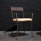 Nice chair with dark metal armrests.