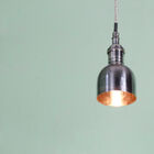 Lines with an industrial character for a charming luminaire.