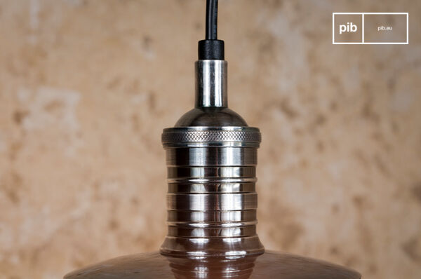 This brass suspension light has a beautiful silver-plated finish