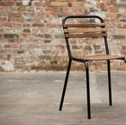 Beautiful wooden and metal chair in industrial style.