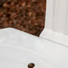 The chair has a beautiful white lacquered finish.