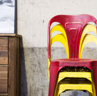 The chairs are stacked thanks to their hollow legs.