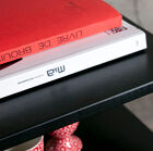 its compact size also allows it to be used as a bedside table.