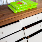 The chest of drawers has 9 spacious storage spaces.