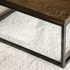 The metal base gives the table all its stability.