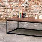 Beautiful wooden coffee table with black structure.