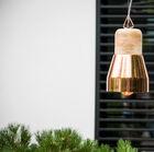 Suspension of a copper plated walleye in metal and wood.