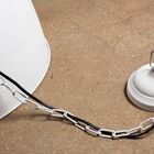 Its black power cable is associated with a chain.