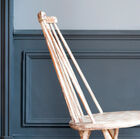 White stains that are reminiscent of the clouds of a day in late summer cover the entire structure