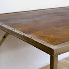Top in varnished solid oak and overhead metal structure.