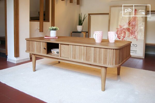 A coffee table all in light wood
