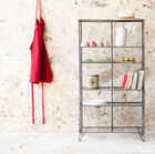 A charming metal bookcase.