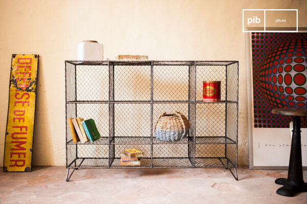 The shelf has a superb industrial look from the 1950s.