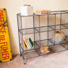 The shelf has 12 storage compartments.