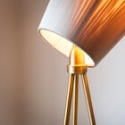 The bulb is reflected on the golden foot and sends a beautiful light.