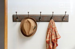 Weathered wall-mounted coat hook