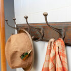 The association between the patinated wood and the melting of the hooks is superb.