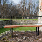 Nice wooden bench with black base.