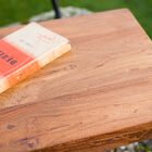 The seat is made of solid recycled and varnished teak.